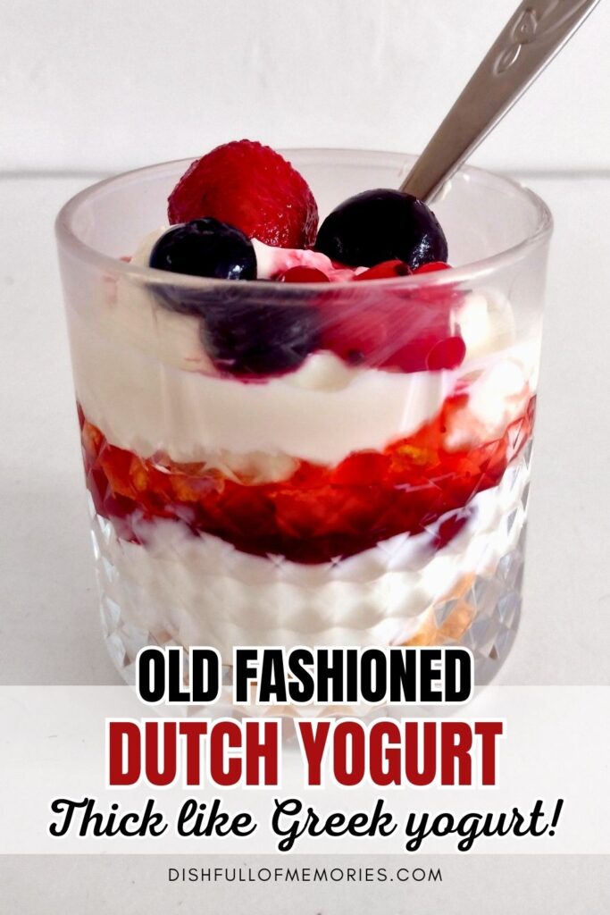Glass filled with layered yogurt and red syrup and red berries, spoon sticking out. Text on image: Old fashioned Dutch yogurt thick like Greek yogurt! Dish full of memories dot com.