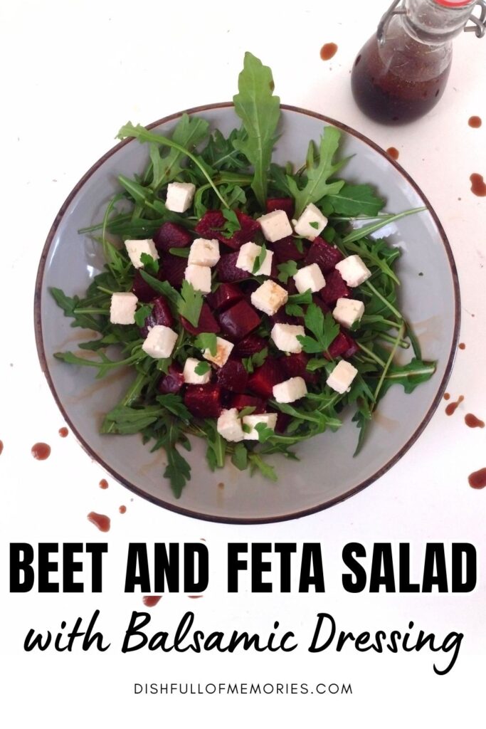 Serving plate filled with arugula, red beets, and feta salad photographed from above. Text on image: Beet and Feta Salad with Balsamic Dressing. Dish full of memories dot com.