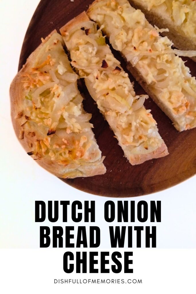 Dutch onion bread with cheese (Uienkruier) on round, wooden serving tray. Text on image: Dutch onion bread with cheese. Dish full of memories dot com.