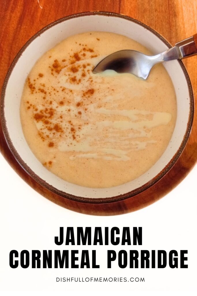 Bowl of homemade Jamaican porridge on wood serving tray. Text on image: Jamaican cornmeal porridge. Dish full of memories dot com.