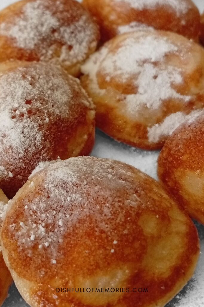 Fluffy homemade Dutch poffertjes traditional mini pancakes.