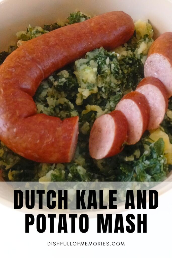 Smoked sausage on top of bowl of Boerenkool Stamppot. Text on image: Dutch Kale and Potato Mash. Dish Full of Memories dot com.