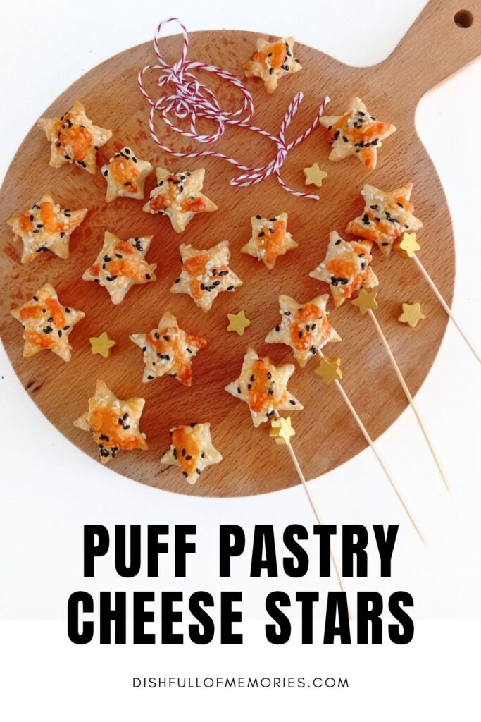 Little pastry appetizers on round serving board. Text on image: Puff pastry cheese stars. Dish full of memories dot com.